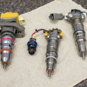 HEUI diesel injectors prepared for stiction poppet valve and control pressure testing